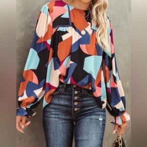 Abstract pattern crewneck ruffled puff sleeve blouse